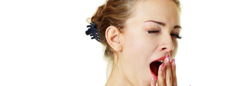 Como evitar o excesso de sono - Mulher bocejando - Euro Colchões